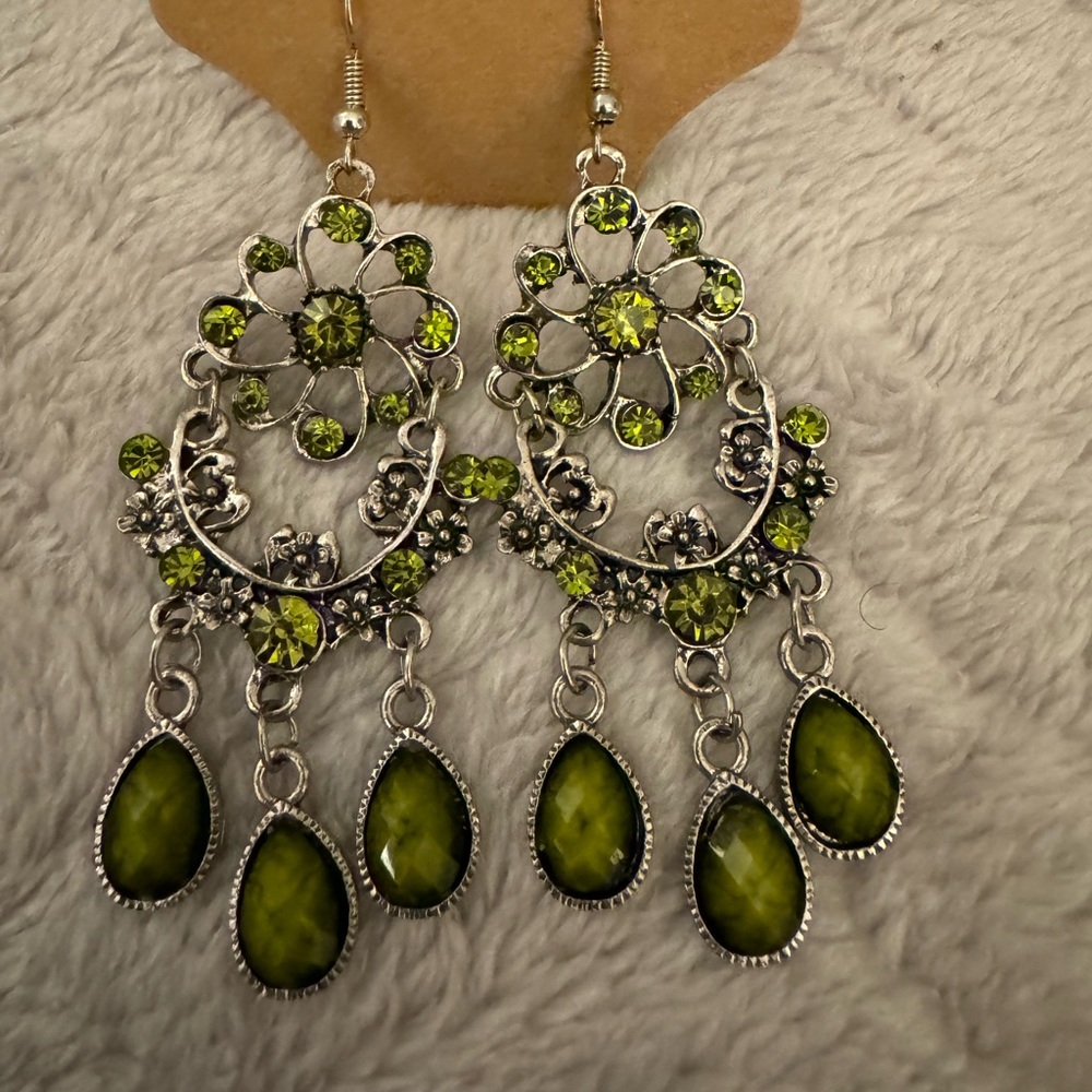 Silver with green stones